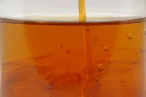 Applying Axxanol 707C to hydroelectric gearbox oil.