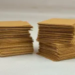 Stack of 2-inch VCI Chips for added protection in storage and shipping.