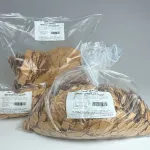 Bulk packaging bags of ICT420-170 chips in multiple quantities.