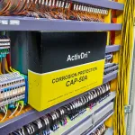 Moisture control capsule protecting an enclosure’s internal components