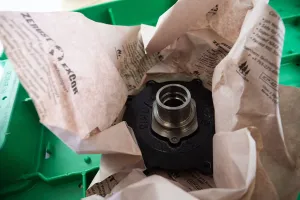 Metal part wrapped in corrosion-inhibiting paper