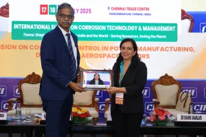 Dr. Mahin Shahlari receiving plaque from Dr. U. Kamachi Mudali at CII CORTEM 2025 for her presentation about Corrosion Prevention Solutions