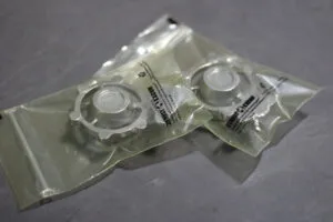Cast metal parts wrapped for warehouse storage
