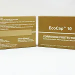 Front and back view of ZERUST EcoCap 10 capsule with adhesive mounting strip