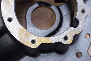 Close-up of rusted metal part stored on pallet