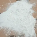 Close-up of AxxaVis WBA-10 wet vapor blasting additive powder