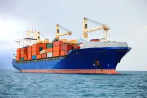 Cargo ship transporting products with corrosion protection in logistics