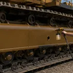 Sprayable Rust Preventative Coating protecting crawler track on mining equipment during outdoor storage