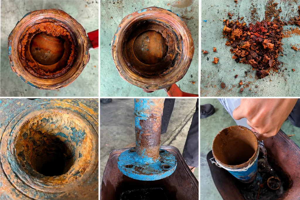 Heavily rusted cooling water pipe requiring a cooling tower rust remover